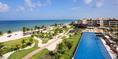 beach and sea near outdoor pool area
