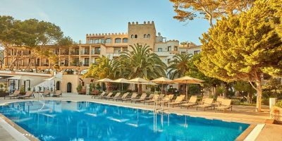 outdoor pool by sunbeds